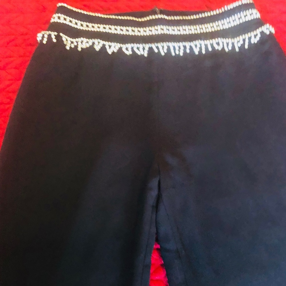 Designer black pants with rhinestone waist